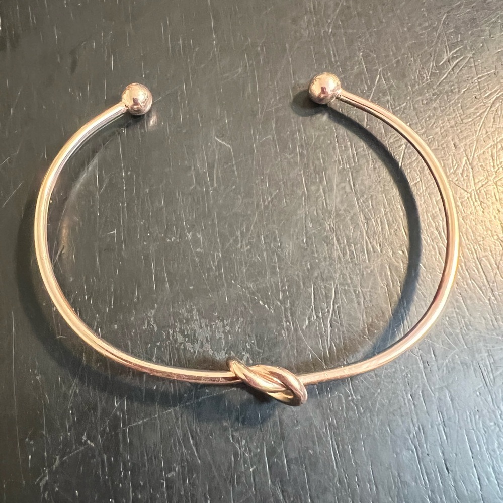 ONE 6” GOLDTONE LOVE KNOT CUFF BRACELET CTM1